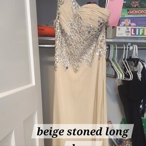 Flesh colored formal dress.